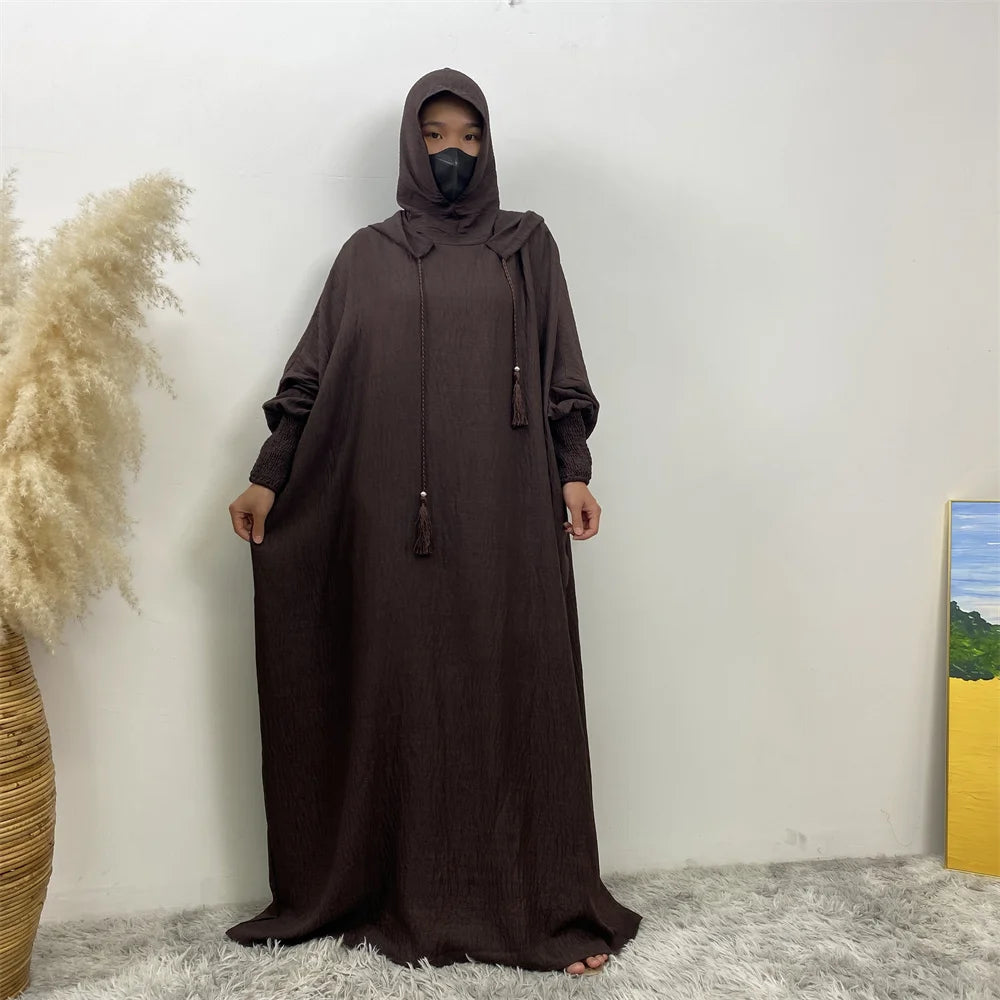 Robe Abaya Noravia – Élégance du Moyen-Orient à capuche