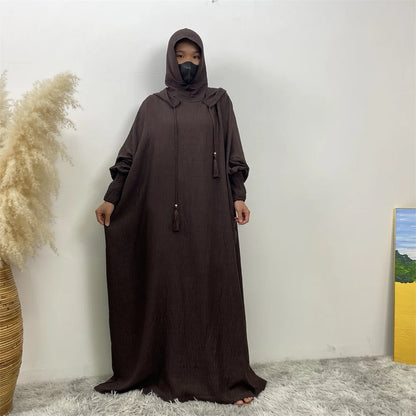 Robe Abaya Noravia – Élégance du Moyen-Orient à capuche