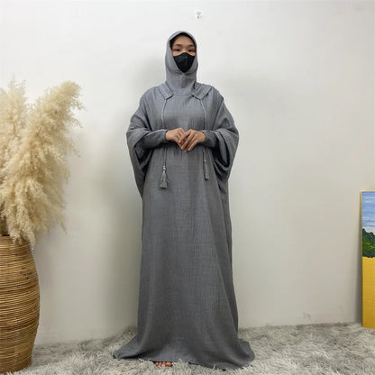 Robe Abaya Noravia – Élégance du Moyen-Orient à capuche